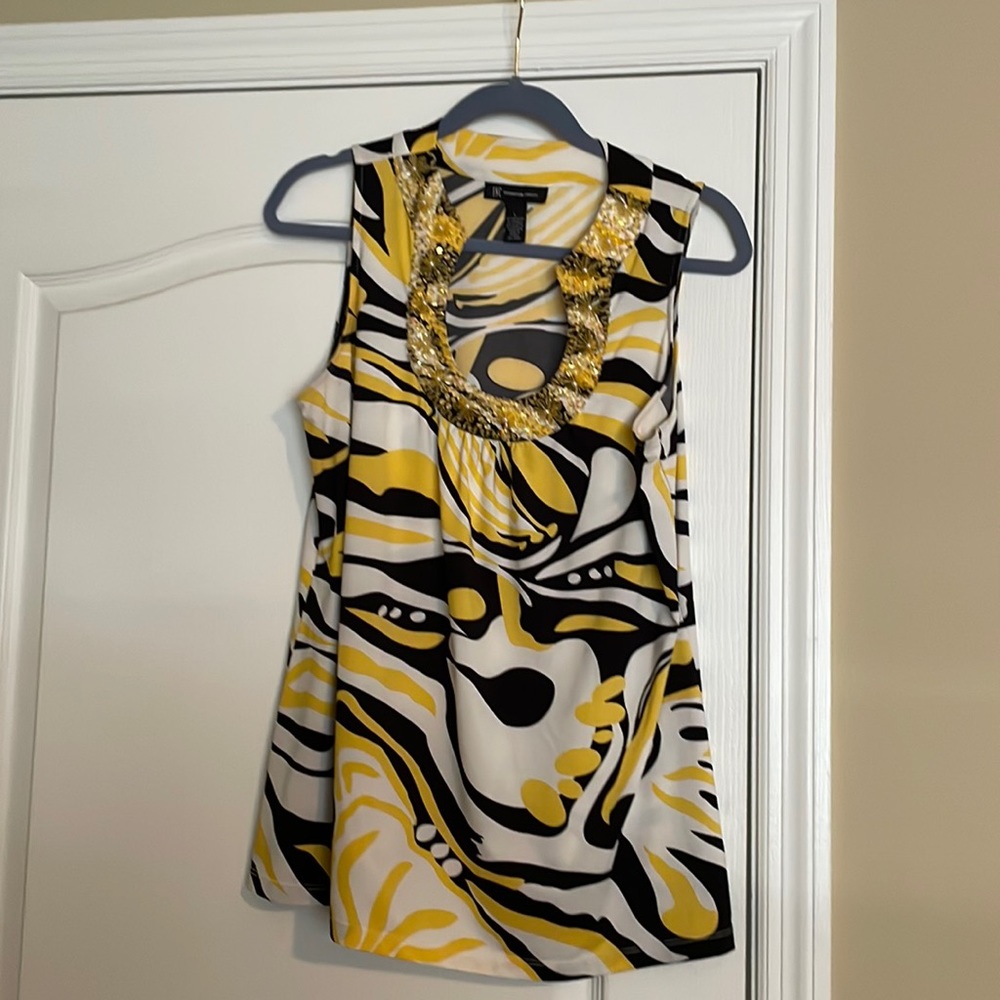 Black and yellow sleeveless top with beaded neckline